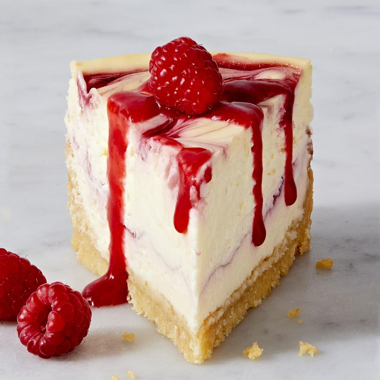 raspberry cheesecake with raspberry sauce swirl