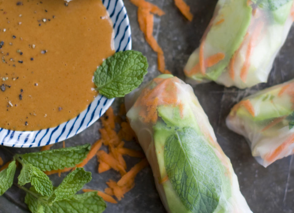 This Dec. 2, 2013 photo shows chicken and jicama spring rolls with peanut sauce in Concord, N.H. (AP Photo/Matthew Mead)