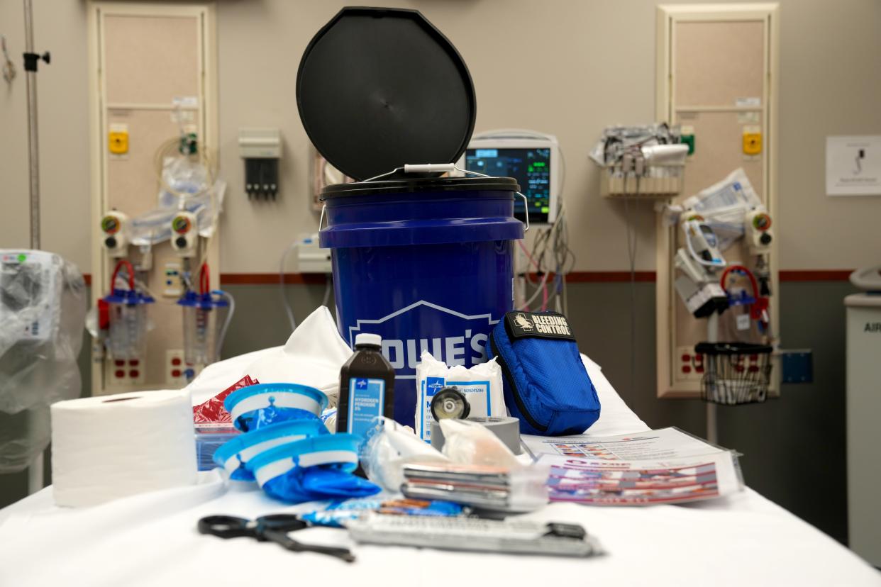 An example of what could be included in a "barricade bucket" for use in case of emergency was displayed Wednesday at a supply drive at Atrium Medical Center in Middletown.