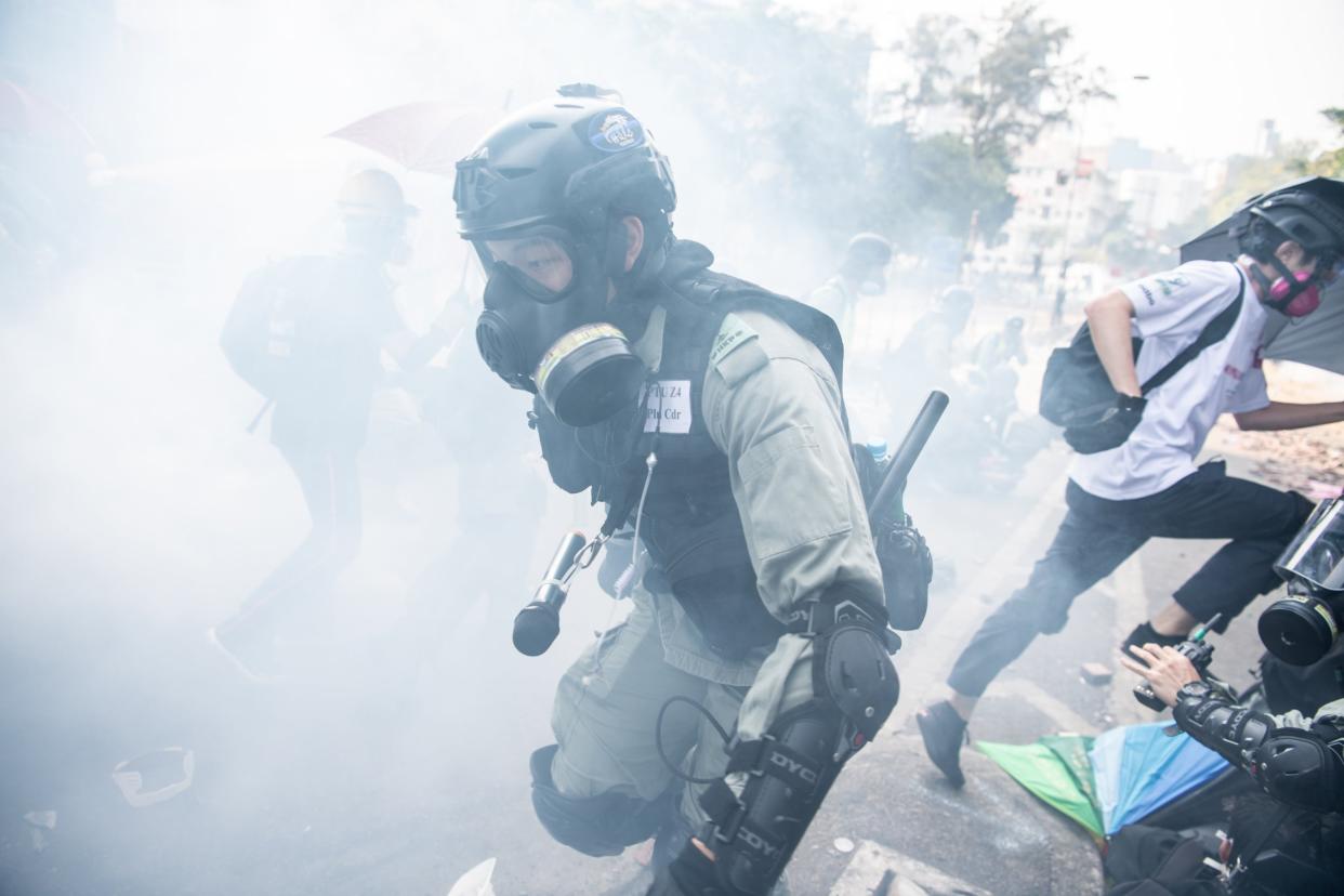 Chaotic scenes on Monday as police moved in on a Hong Kong campus occupied for days by protesters: Getty