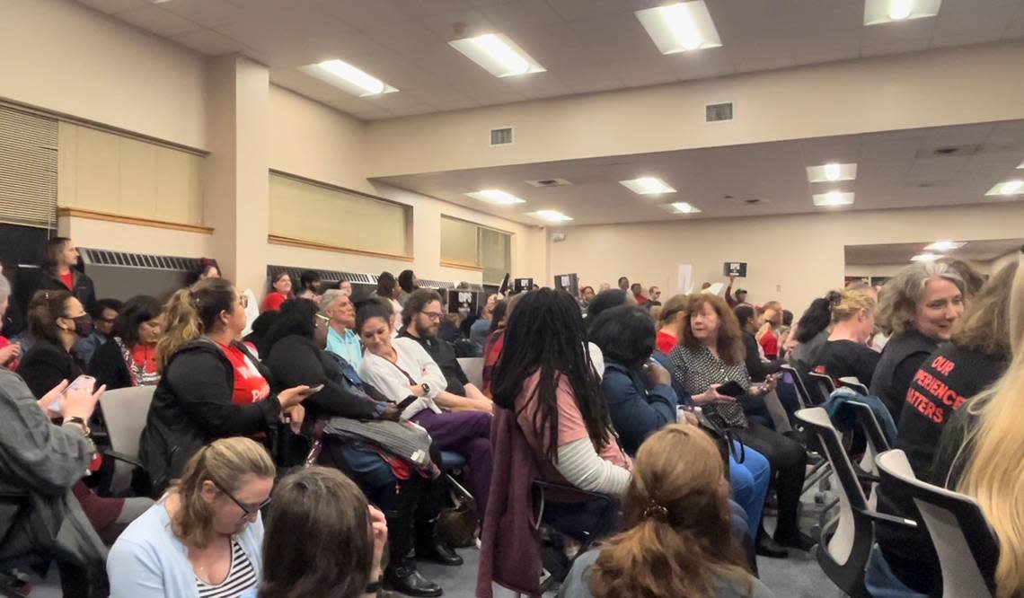 Durham Public Schools educators, parents and students crammed into a board room for the Board of Education meeting on Thursday, January 25, 2024. The crowd outside numbered in the hundreds.