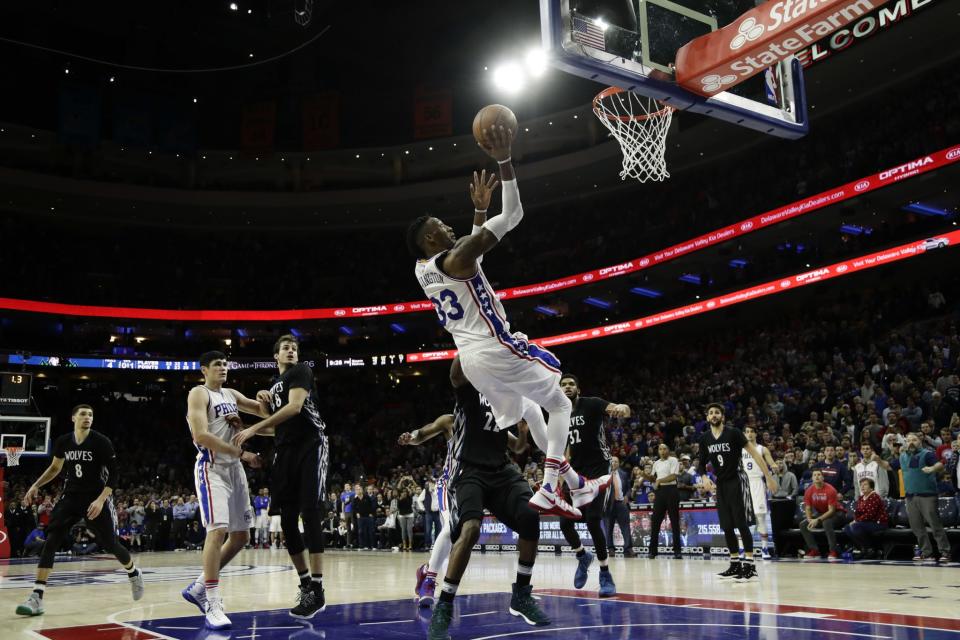 Robert Covington catches and converts. (AP)