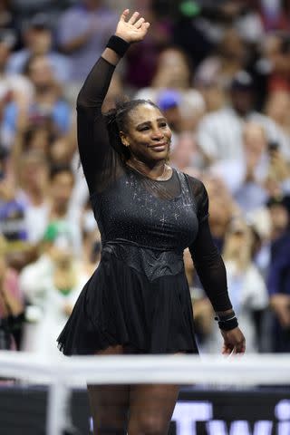 <p>Al Bello/Getty </p> Serena Williams waves to the crowd after playing her last match at the U.S. Open