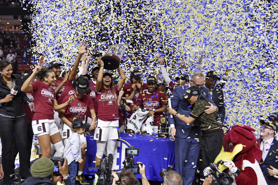 South Carolina celebrates after defeating Mississippi State in a championship match at the Southeastern Conference women's NCAA college basketball tournament in Greenville, S.C., Sunday, March 8, 2020. (AP Photo/Richard Shiro)