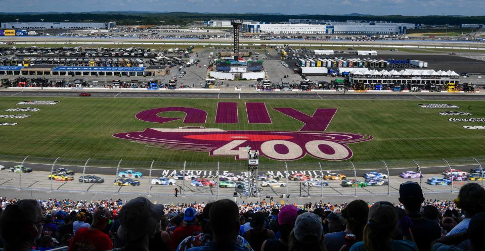 Fans watch the NASCAR Cup Series Ally 400 race at the Nashville Superspeedway in Lebanon, Tenn., Sunday, June 20, 2021.