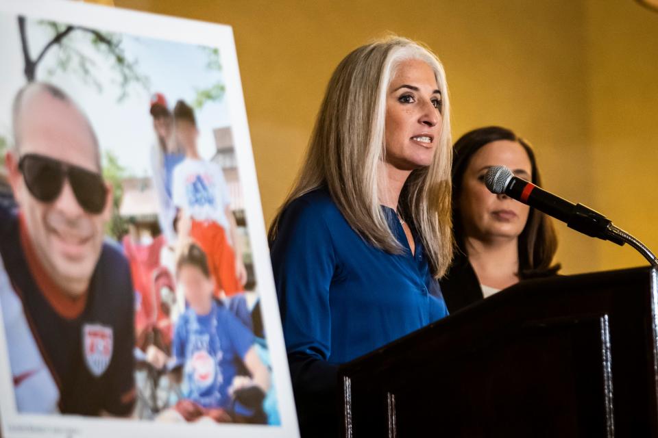 Plaintiff Lauren Bennett, who was shot twice in her hip and back during the Highland Park Fourth of July parade massacre, speaks during a news conference in Northbrook, Ill., on Wednesday, Sept. 28, 2022.