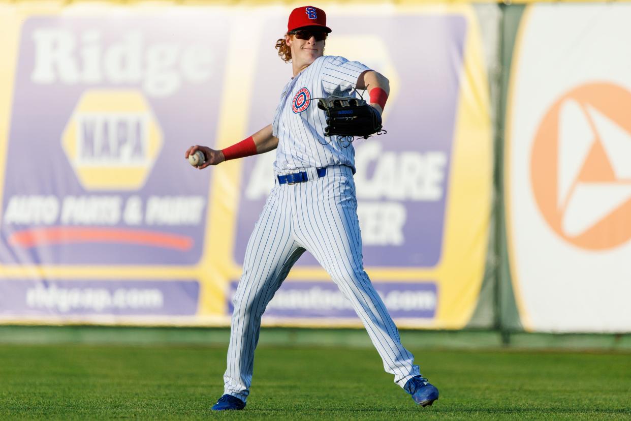 South Bend Cubs Owen Caissie (20) throws the ball during the South Bend Cubs-Fort Wayne Tin Caps baseball game on Friday, May 13, 2022, at Four Winds Field  in South Bend, Indiana.