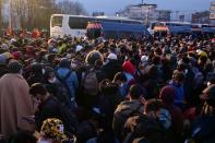 French gendarmes evacuate makeshift migrant camp in the outskirts of Paris