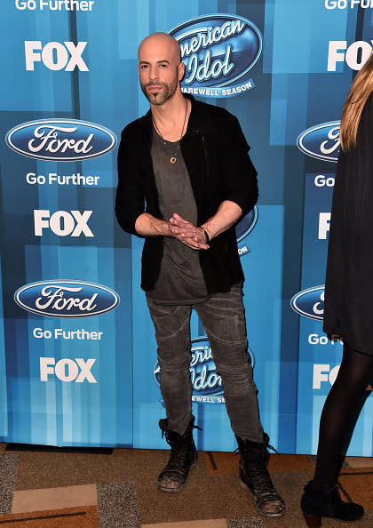 Chris Daughtry giving off major emo vibes in destroyed boots and a black cardigan 