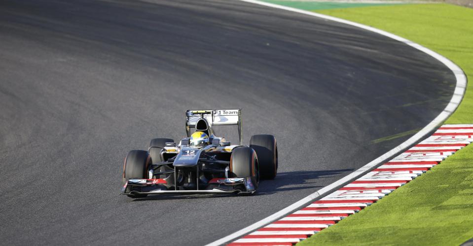 Sauber Formula One driver Esteban Gutierrez of Mexico races during the Japanese F1 Grand Prix at the Suzuka circuit October 13, 2013. Sauber's Gutierrez became the first rookie driver to score a point this season with seventh place for Sauber. REUTERS/Issei Kato (JAPAN - Tags: SPORT MOTORSPORT F1)