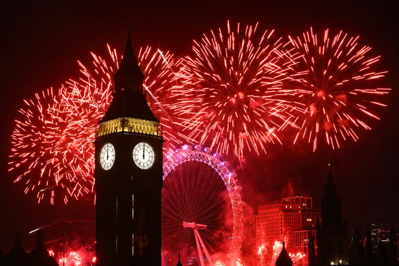 Fireworks light up the London skyline over Big Ben and the London Eye just after midnight on January 1, 2024