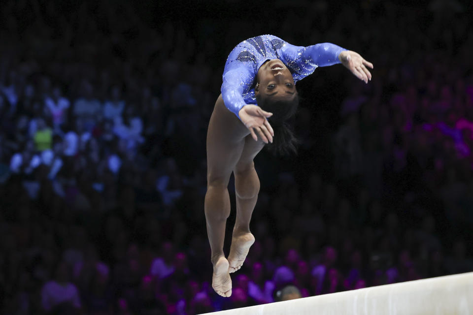 United States' Simone Biles competes on the beam during the women's all-round final at the Artistic Gymnastics World Championships in Antwerp, Belgium, Friday, Oct. 6, 2023. (AP Photo/Geert vanden Wijngaert)