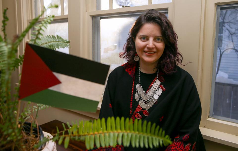 Deema Totah, a native of Palestine, is pictured in her home Tuesday, Jan. 16, 2024 in Iowa City, Iowa. Totah has been advocating locally for peace in the Israel-Hamas war.