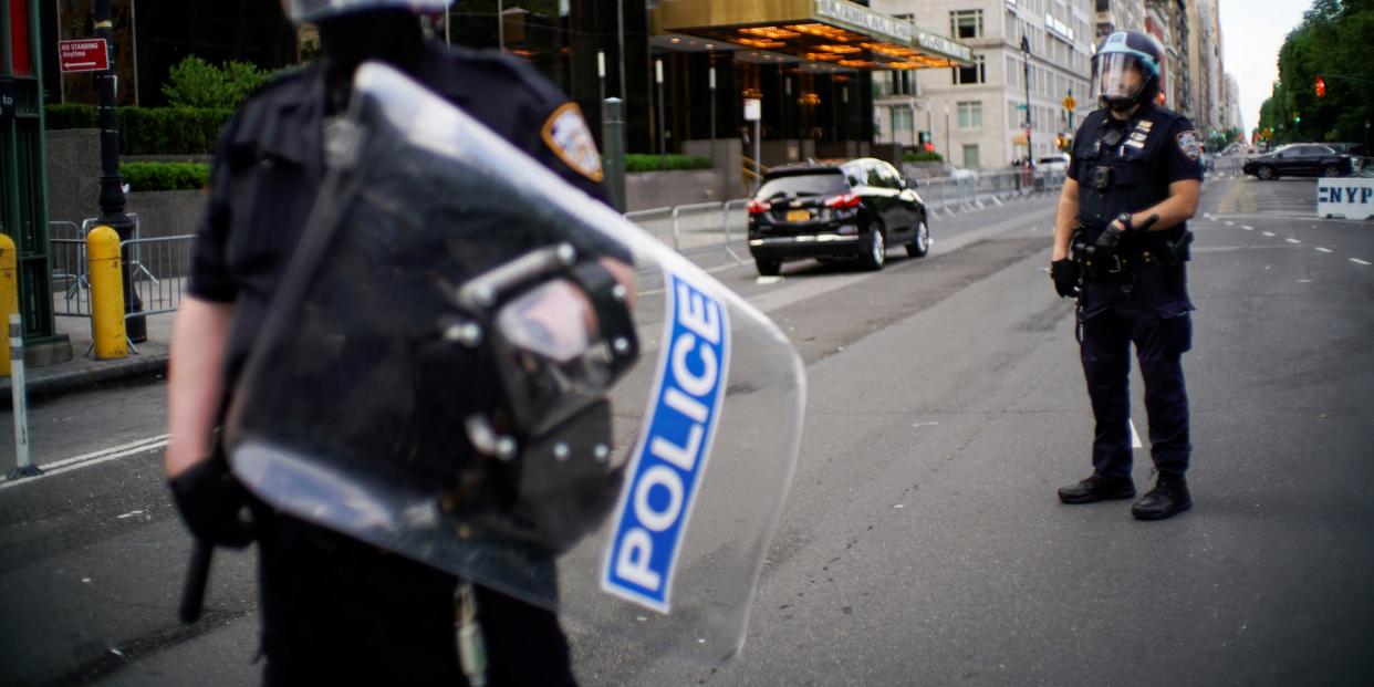 Police officers stand guard during a protest against the death in Minneapolis police custody of George Floyd, in New York City, U.S., June 3, 2020..JPG