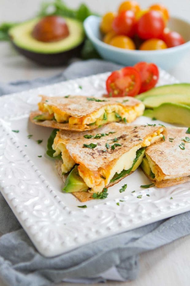 <p>Kick off your day with a spinach avocado breakfast quesadilla. High on protein and filled with flavor!</p><p><strong>Get the recipe: <a href="https://www.cookincanuck.com/spinach-avocado-breakfast-quesadilla/" rel="nofollow noopener" target="_blank" data-ylk="slk:Spinach Avocado Breakfast Quesadilla;elm:context_link;itc:0;sec:content-canvas" class="link "><em>Spinach Avocado Breakfast Quesadilla</em></a></strong></p><p>Cookin' Canuck</p>