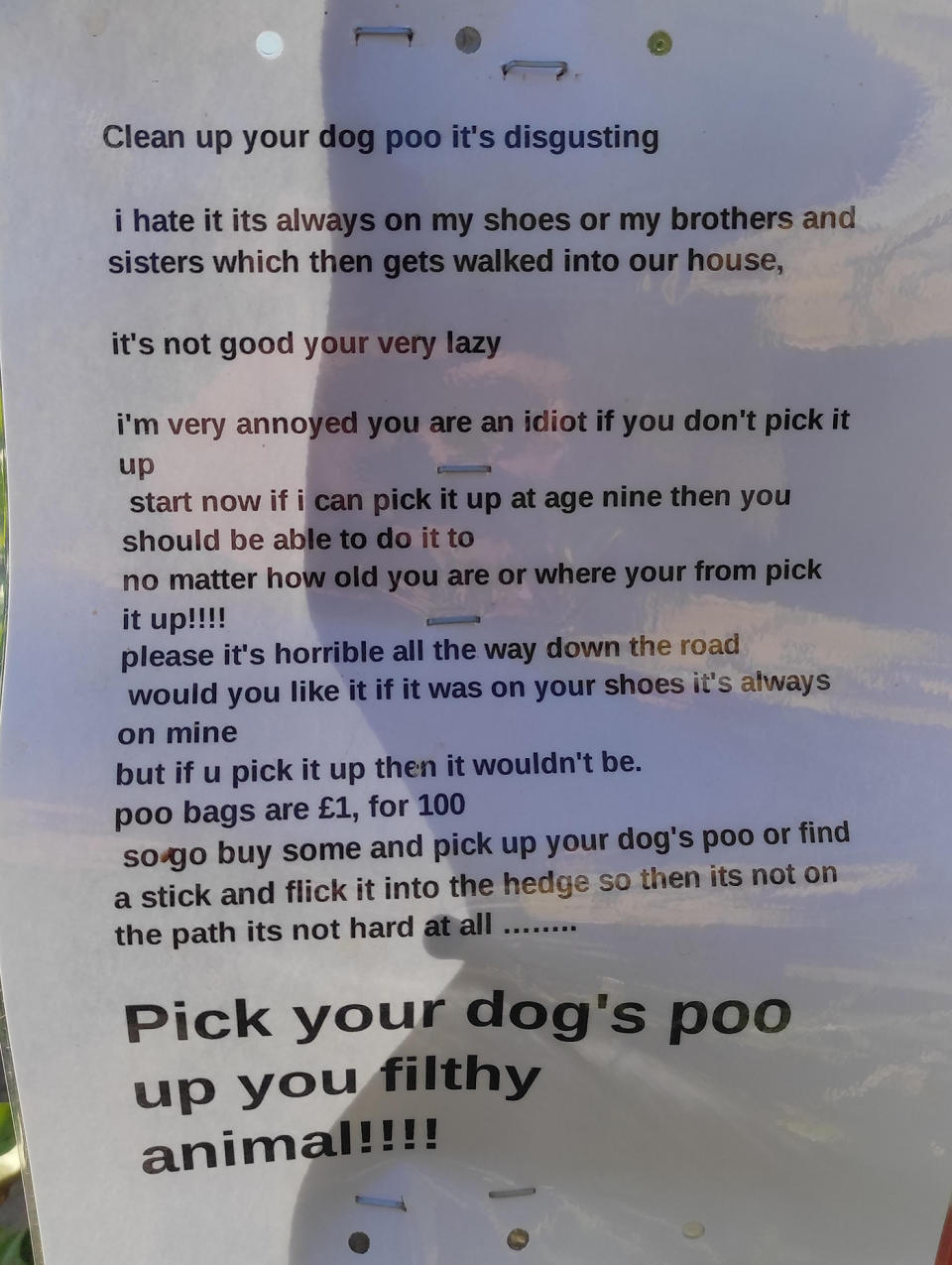 A note from a nine-year-old kid demands people pick up their dog poo.