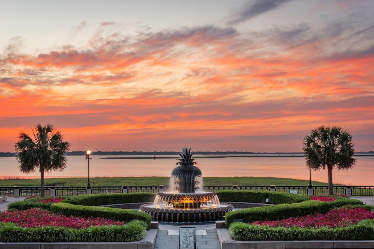 Waterfront park with pineapple fountain at sunrise in Charleston, South Carolina