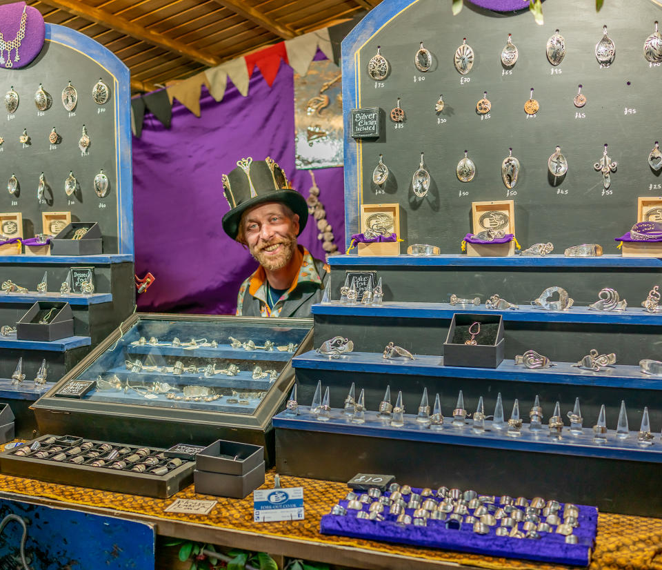 York, Yorkshire, UK – November 23 2019: Spoon artist street vendor with his display of products on sale at the 2019 Christmas market.

The entire city of York participates in the annual Christmas market and this free to enter event, with no restrictions, attracts thousands of visitors each and every year.