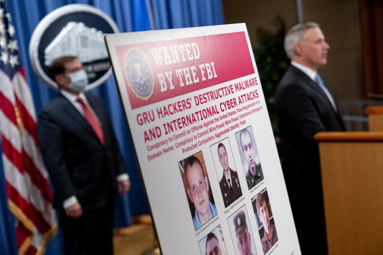 <span class="caption">The Department of Justice indicted six officers of Russia's GRU military intelligence service in October 2020 on charges of hacking and deploying malware.</span> <span class="attribution"><a class="link " href="https://www.gettyimages.com/detail/news-photo/poster-showing-six-wanted-russian-military-intelligence-news-photo/1229171656" rel="nofollow noopener" target="_blank" data-ylk="slk:Andrew Harnik - Pool/Getty Images;elm:context_link;itc:0;sec:content-canvas">Andrew Harnik - Pool/Getty Images</a></span>