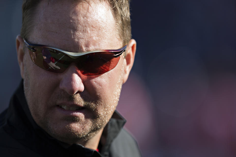 OXFORD, MS - NOVEMBER 26:  Head Coach Hugh Freeze of the Mississippi Rebels watches his team warm up before a game against the Mississippi State Bulldogs at Vaught-Hemingway Stadium on November 26, 2016 in Oxford, Mississippi.  The Bulldogs defeated the Rebels 55-20.  (Photo by Wesley Hitt/Getty Images)