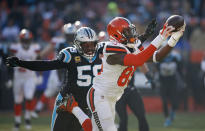 Cleveland Browns tight end David Njoku (85) catches a pass under pressure from Carolina Panthers outside linebacker Thomas Davis (58) during the first half of an NFL football game, Sunday, Dec. 9, 2018, in Cleveland. (AP Photo/Ron Schwane)