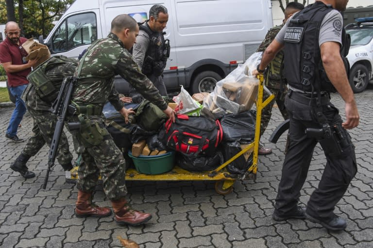 Police and military Police and military officers seized a haul of drugs in their crackdown at the Jacarezinho favela in Rio de Janeiro