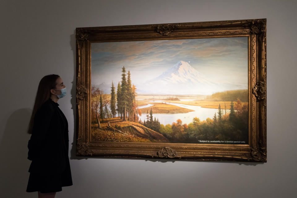 LONDON, UNITED KINGDOM - JUNE 24: A staff member looks at 'Subject to Availability' by Banksy, estimate Â£3,000,000 - 5,000,000 during a photo call for the 20th/21st Century: London Evening Sale at Christie's auction house in London, United Kingdom on June 24, 2021. (Photo by Wiktor Szymanowicz/Anadolu Agency via Getty Images)