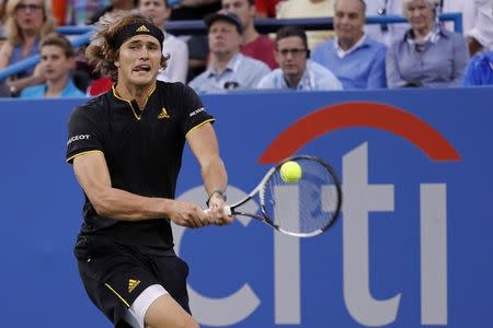 Aug 5, 2017; Washington, DC, USA; Alexander Zverev of Germany hits a backhand against Kei Nishikori of Japan (not pictured) in a men's singles semifinal at Fitzgerald Tennis Center. Mandatory Credit: Geoff Burke-USA TODAY Sports