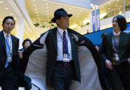 Japan's Finance Minister Taro Aso arrives for the International Monetary and Financial Committee breakfast meeting, during the World Bank/IMF Annual Meetings in Washington, Saturday, Oct. 19, 2019. (AP Photo/Jose Luis Magana)