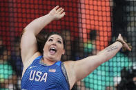 Deanna Price, of the United States, celebrates a throw in the women's hammer throw final at the World Athletics Championships in Doha, Qatar, Saturday, Sept. 28, 2019. (AP Photo/David J. Phillip)