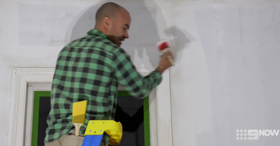 Tom paints a wall on The Block.