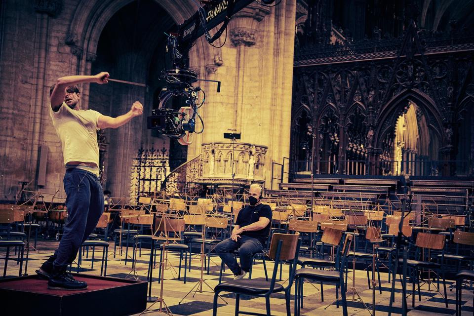 Yannick Nézet-Séguin, right, coaches Bradley Cooper's conducting technique.