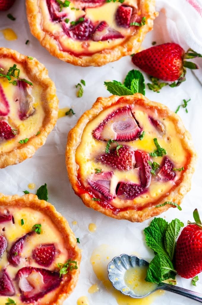 Strawberry and lemon curd tarts.