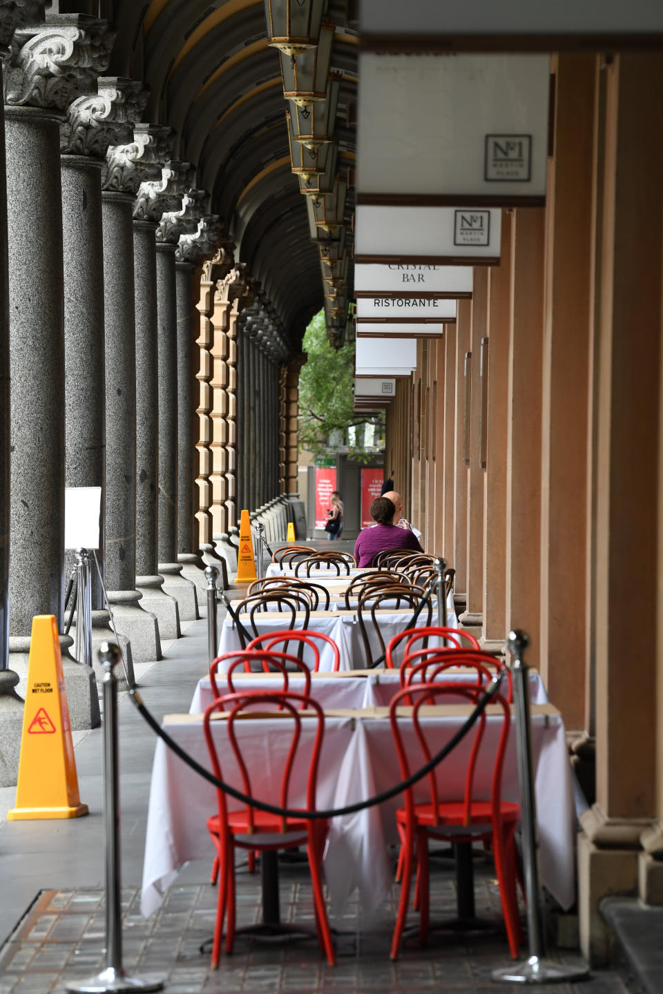 Empty outdoor cafes in the Sydney CBD as NSW rolls out a comprehensive shutdown. Source: Getty Images