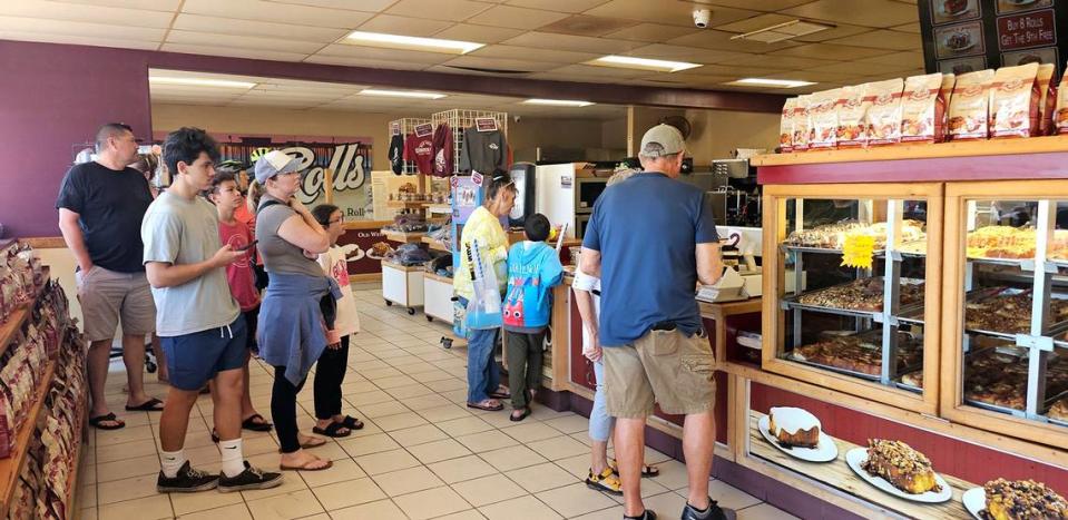 Patrons peruse the offerings at Old West Cinnamon Rolls in Pismo Beach. The shop has been a San Luis Obispo County favorite for nearly 50 years.
