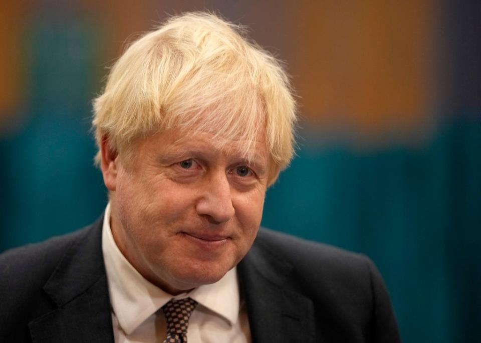 Prime minister Boris Johnson hopes to agree on a set of ambitious objectives to help limit global warming (AP)