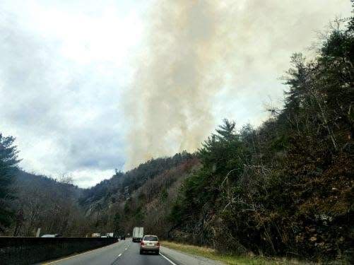 Smoke from the Black Bear Fire in Pisgah National Forest is seen from I-40.