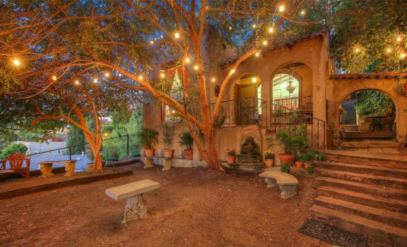 Built in 1928, the charming abode stays in touch with its Spanish roots with arched doorways, beamed ceilings and Saltillo tile.