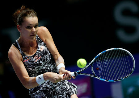 Agnieszka Radwanska of Poland in action against Karolina Pliskova of the Czech Republic. Singapore WTA Finals Round Robin Singles - Singapore Indoor Stadium, Singapore - 28/10/2016. REUTERS/Edgar Su