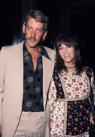 <p>Richard Nairin/Michael Ochs Archives/Getty</p> Donald Sutherland and Jane Fonda photographed in 1972.