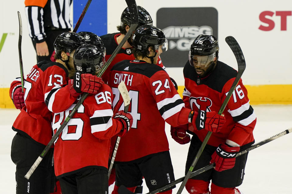 New Jersey Devils defenseman P.K. Subban (76) celebrates with his teammates after scoring during the third period of an NHL hockey game against the Buffalo Sabres, Saturday, Feb. 20, 2021, in Newark, N.J. (AP Photo/John Minchillo)