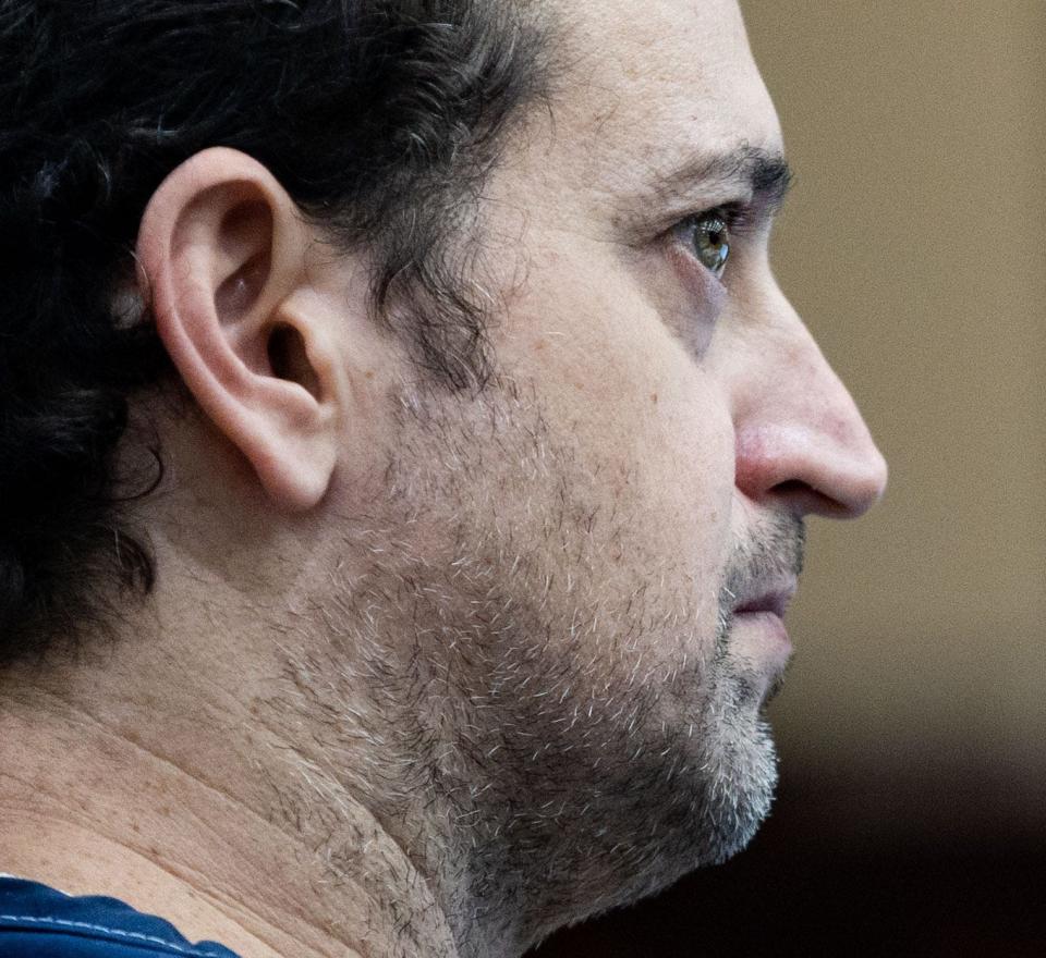 Charlie Adelson, Dan MarkelÕs former brother-in-law, who is accused of orchestrating and financing the shooting of Markel, listens to his attorney Daniel Rashbaum during his bond hearing Friday, Sept. 9, 2022.