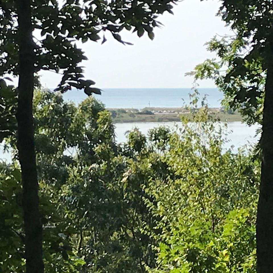 The view from Charlie's Overlook includes Winnapaug Pond, the Misquamicut barrier beach and Block Island Sound.