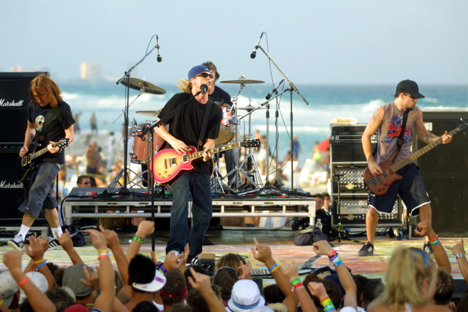 Puddle of Mudd performs during MTV Spring Break 2002 on the beach in front of the Grand Oasis Hotel in Cancun, Mexico.&nbsp;