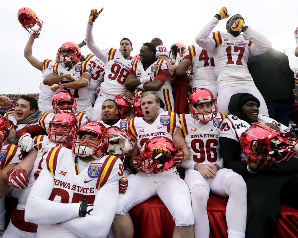 Iowa State players celebrate after beating Memphis in the Liberty Bowl NCAA college football game, Saturday, Dec. 30, 2017, in Memphis, Tenn. Iowa State won 21-20. (AP Photo/Mark Humphrey)