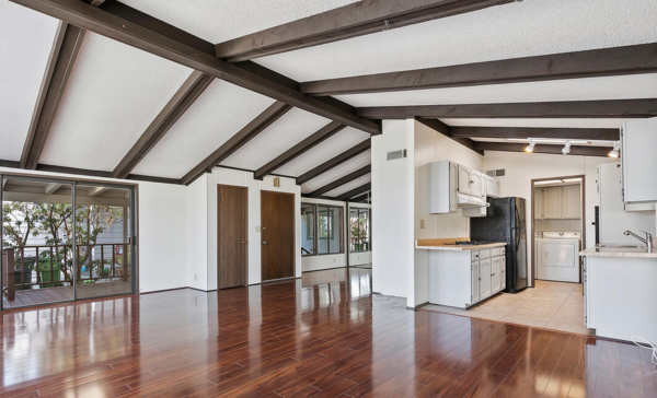 Faced with laminate floors and a poorly organized floor plan, the couple decided to reconfigure the interior.