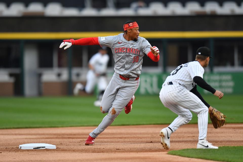Reds center fielder Will Benson rounds second base after hitting a double during the first inning against the Chicago White Sox Friday night.