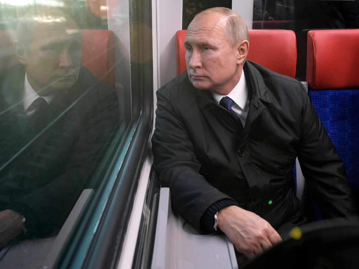 Putin rides a train