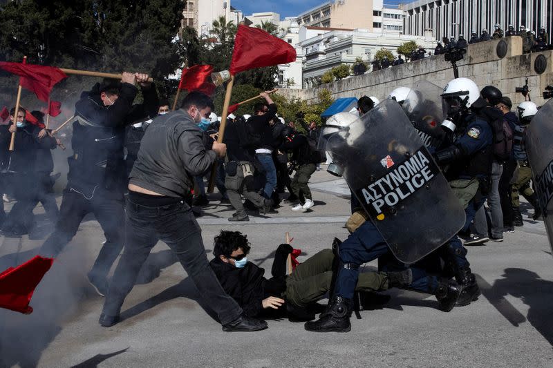 Greek university students clash with riot police during a demonstration against government plans to set up university police, amid the coronavirus disease (COVID-19) pandemic, in Athens