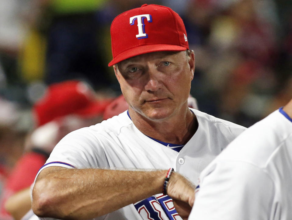 FILE - In this Tuesday, Sept. 18, 2018, file photo, Texas Rangers manager Jeff Banister watches from the dugout during the seventh inning of a baseball game against the Tampa Bay Rays in Arlington, Texas. The Rangers fired Banister on Friday, Sept. 21, 2018. (AP Photo/Mike Stone, File)